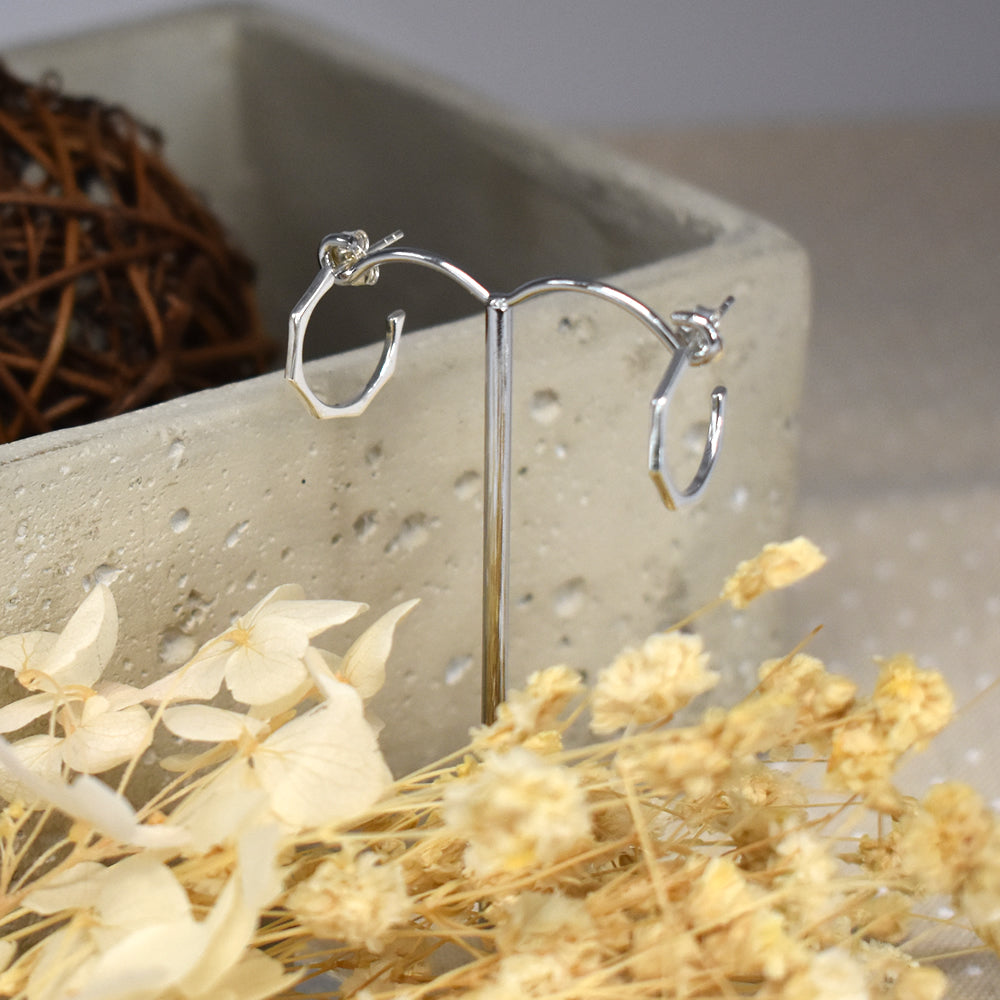 Small silver hoop earrings with stepped edge