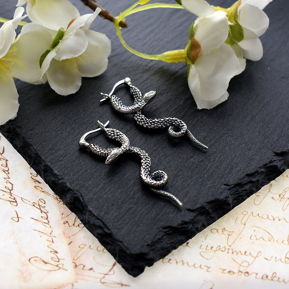 Anya flip top curled snake earrings
