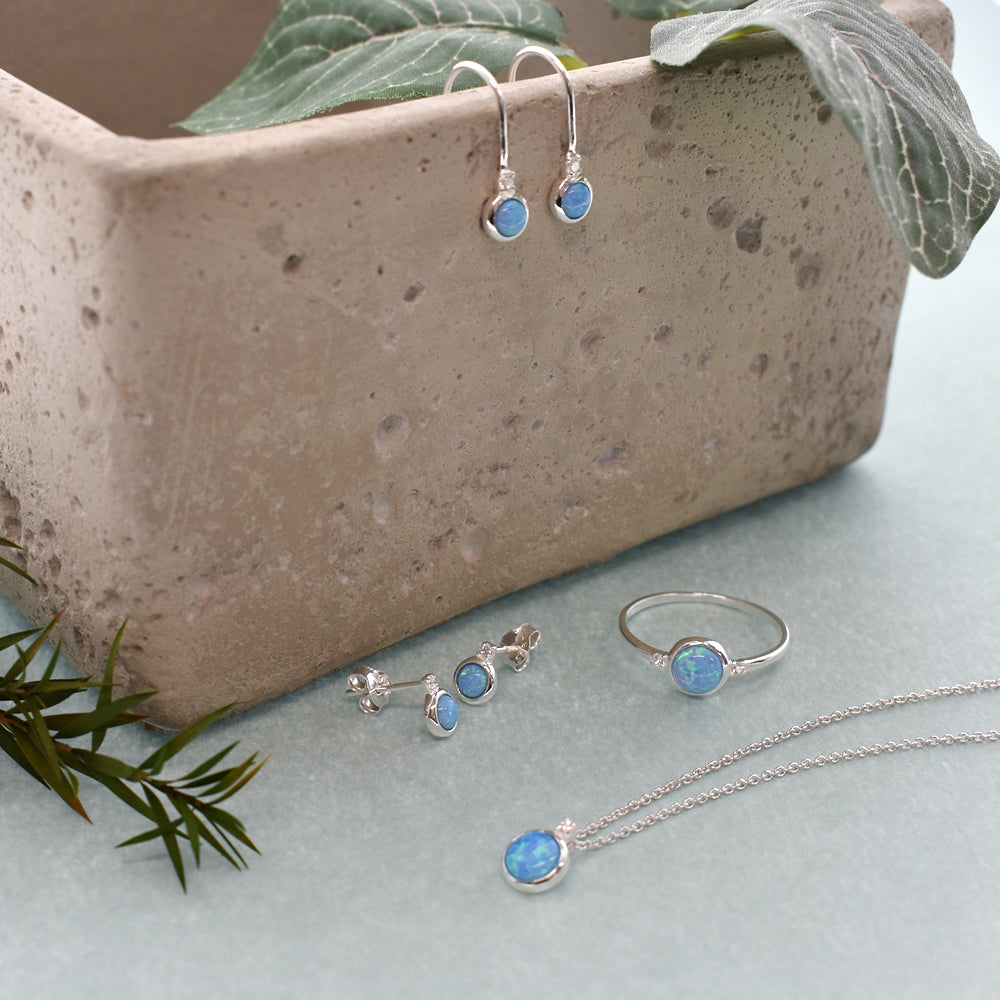 Alexis simple round blue opalique & CZ ring