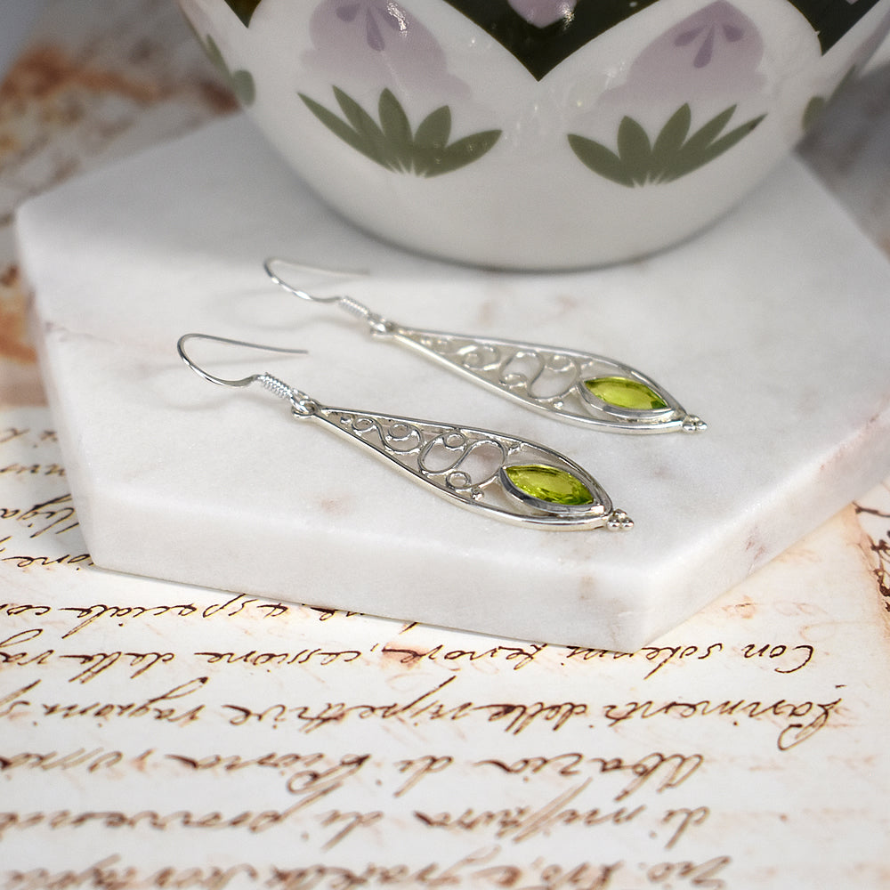 Ivy swirl ellipse peridot earrings