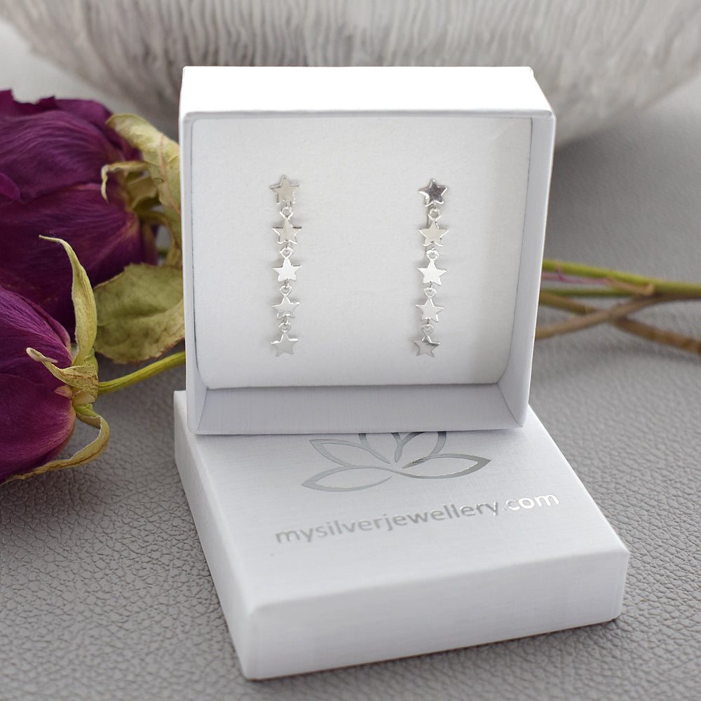 Faith star cascade earrings