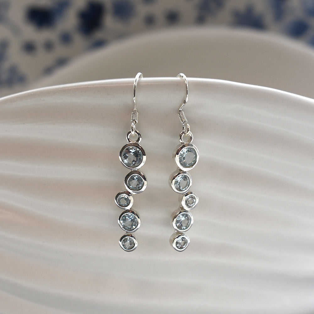 Lola staggered blue topaz earrings