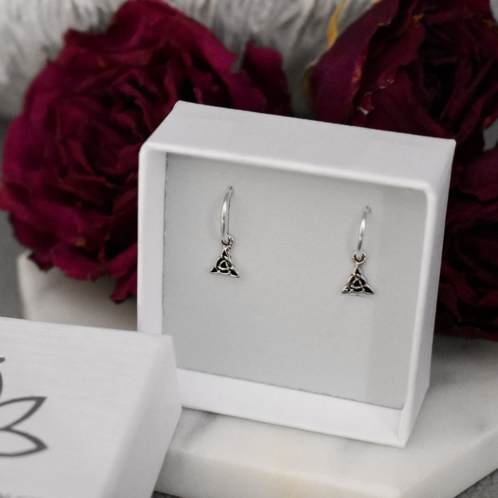 Smile hoop earrings with Celtic charm