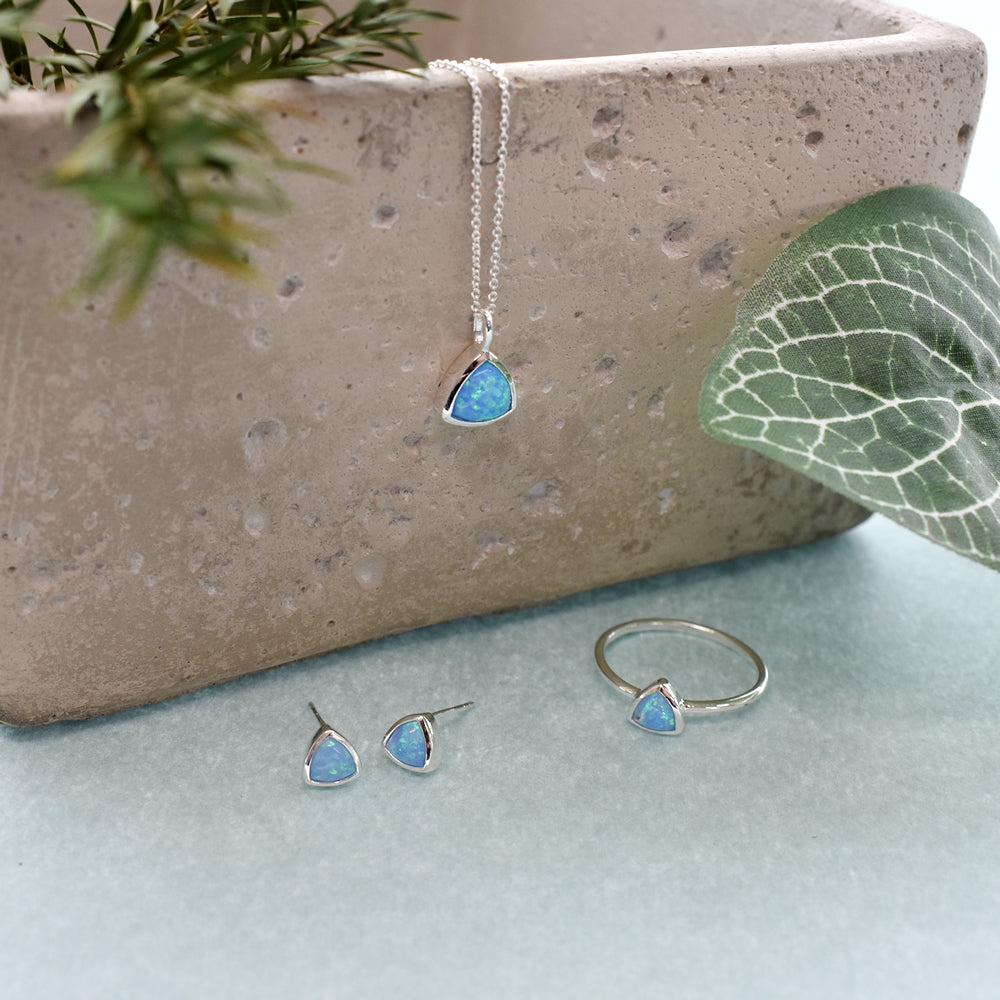 Angelica trillion-cut blue opalique studs