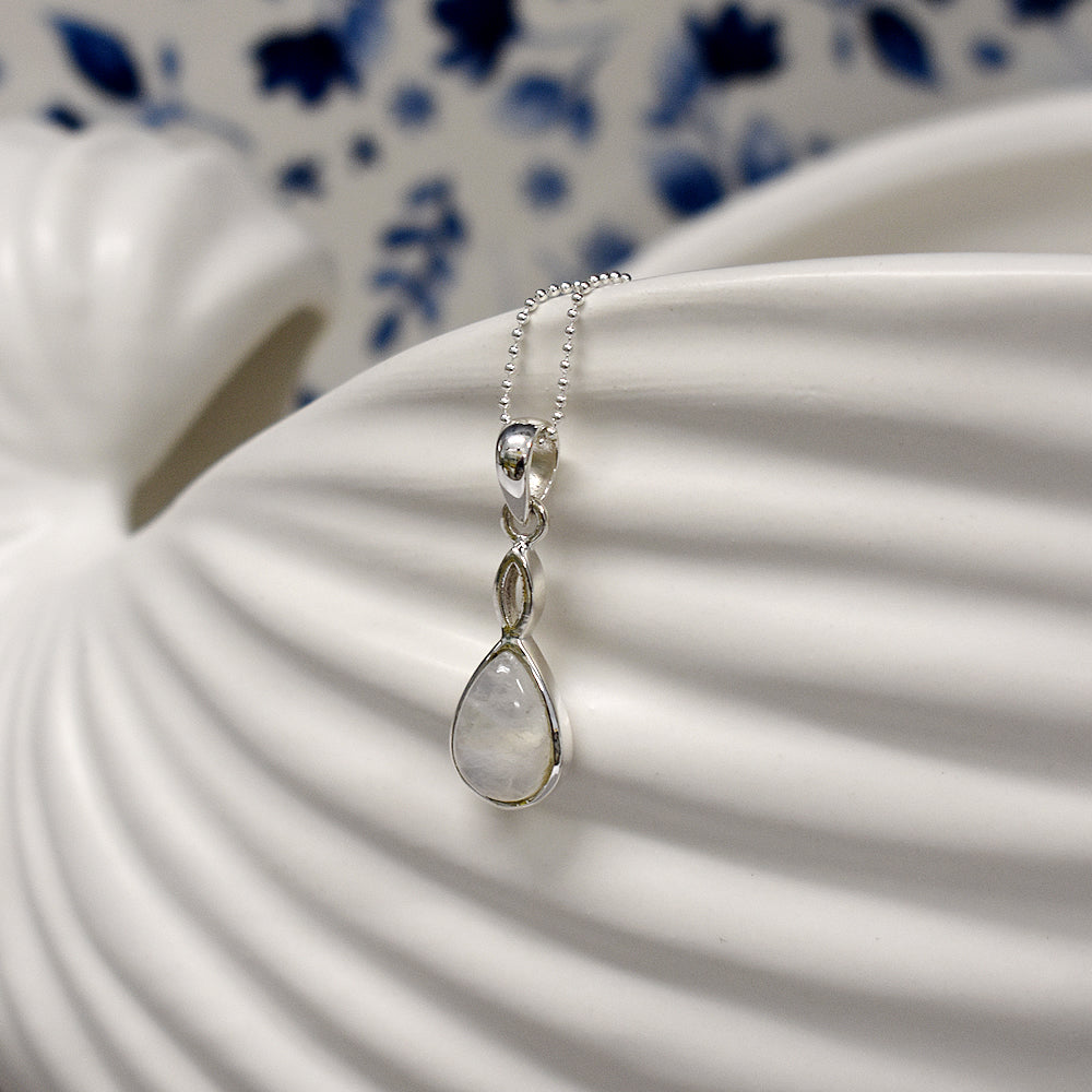 Samira rainbow moonstone crossover pendant