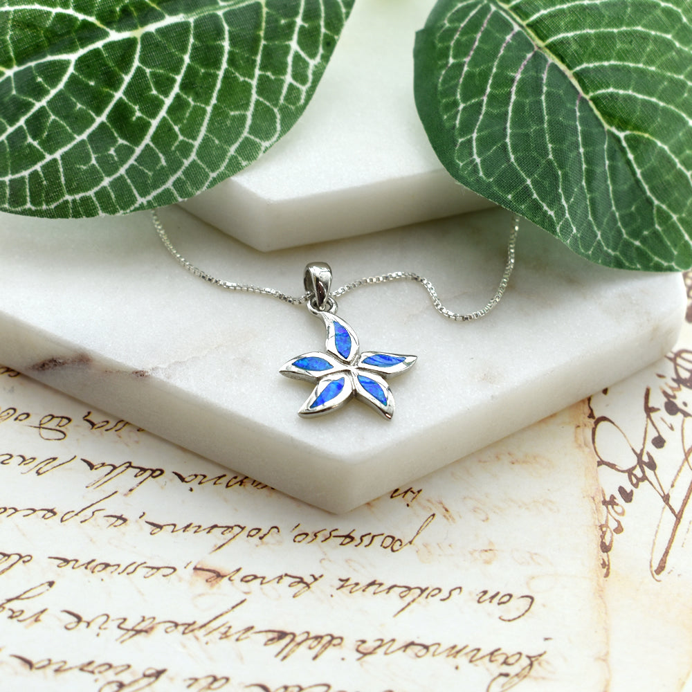 Emerie blue frangipani flower pendants