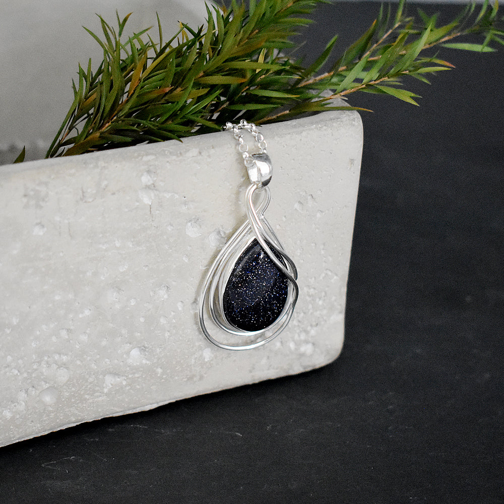Viola teardrop blue goldstone wire detail pendant