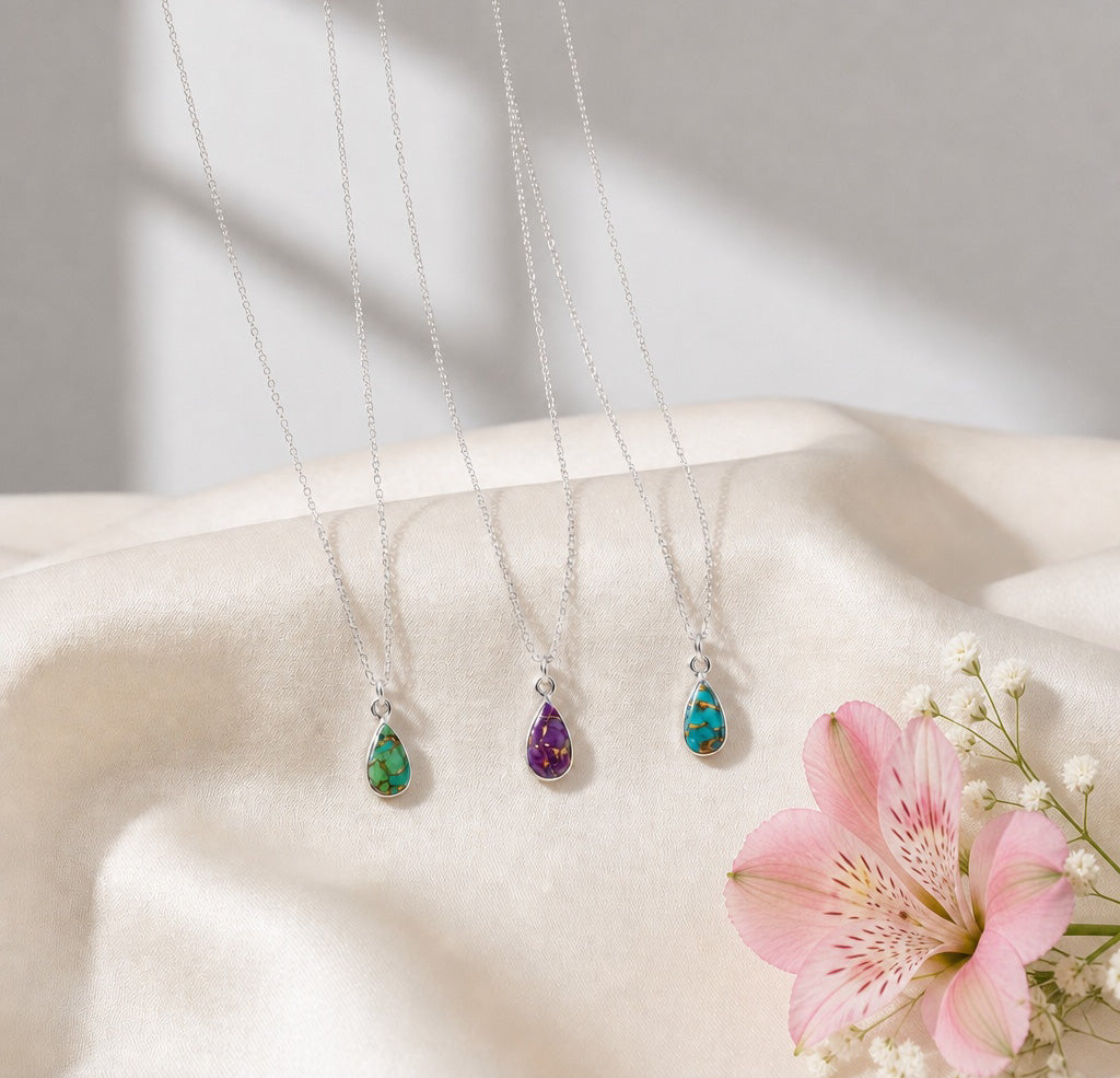 Bridget elongated teardrop purple mohave pendant