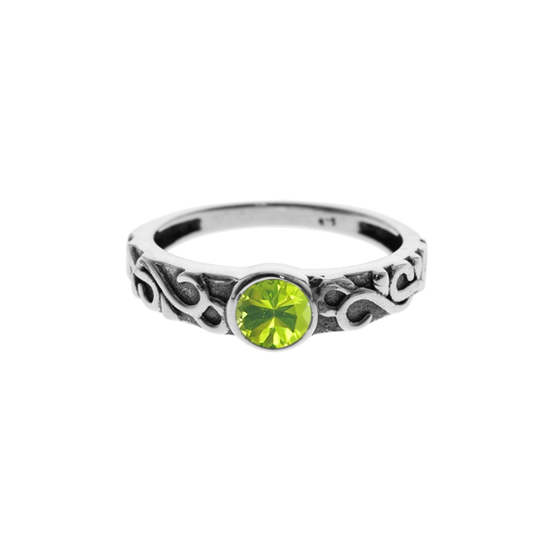 Betsy peridot facet Celtic style ring