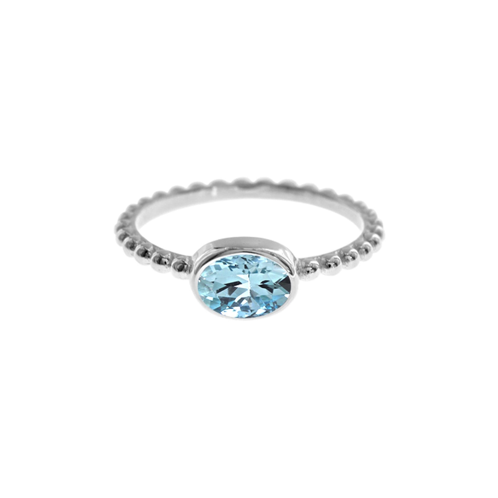 Lola oval blue topaz with ball detail ring