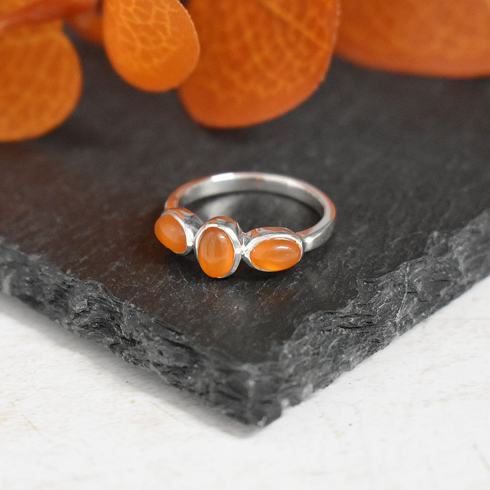 Samira triple offset oval carnelian ring