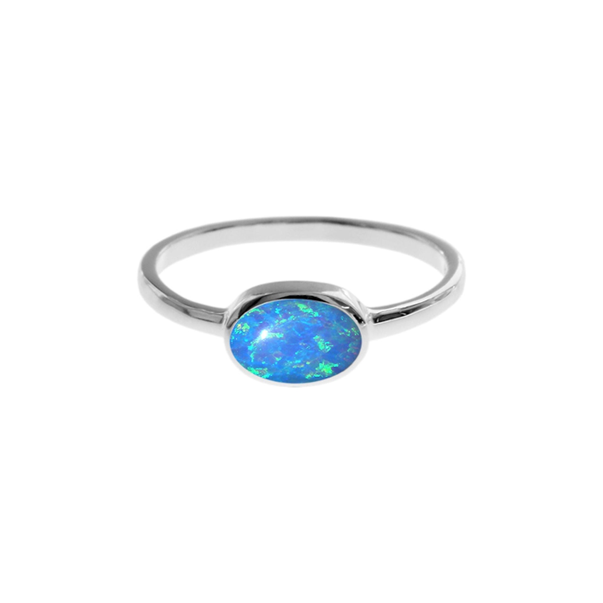 Angelica horizontally set oval blue opalique ring