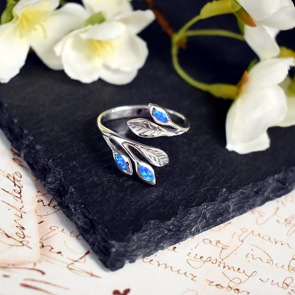 Emerie blue opalique wrap around leaf ring
