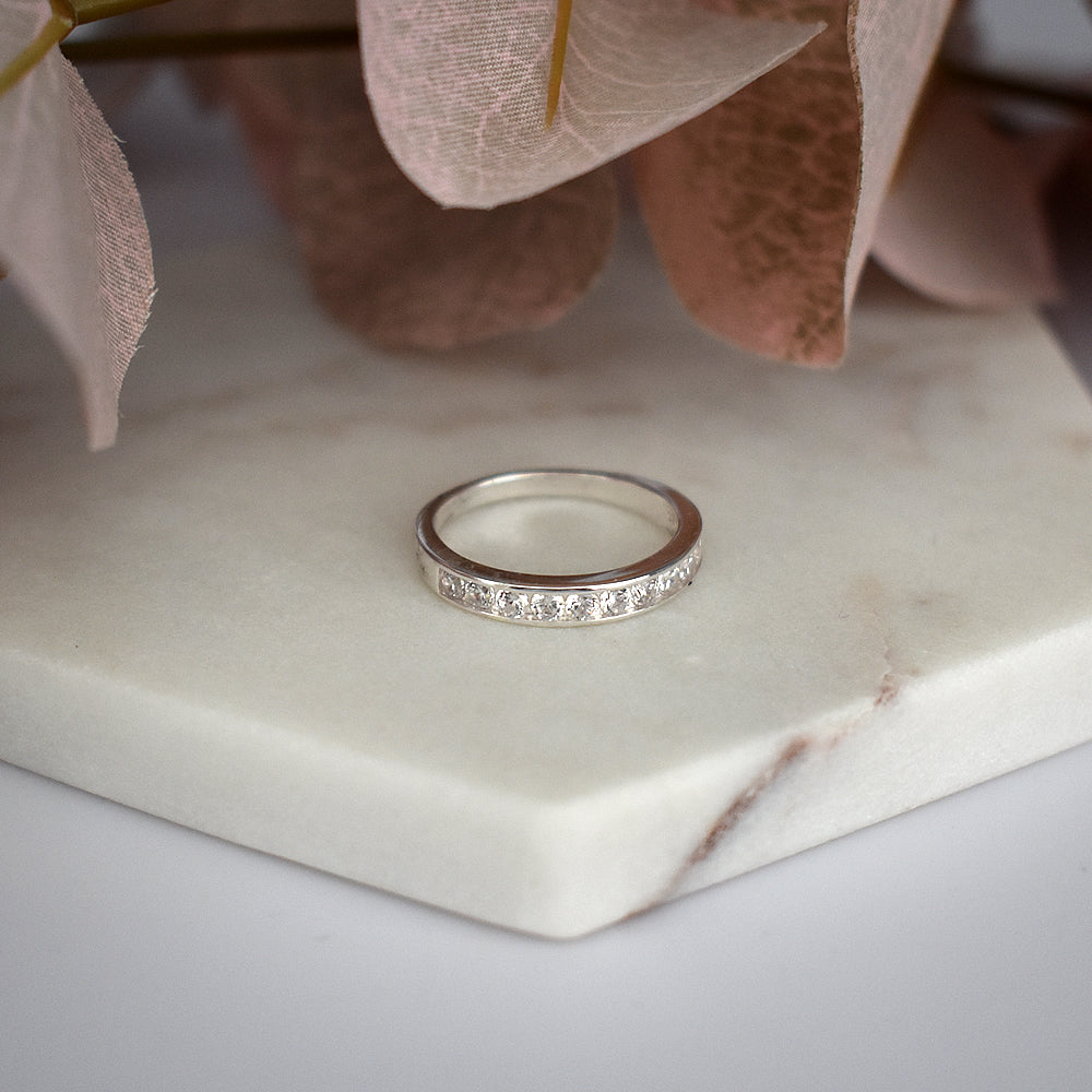 Carrie channel-set CZ half eternity ring