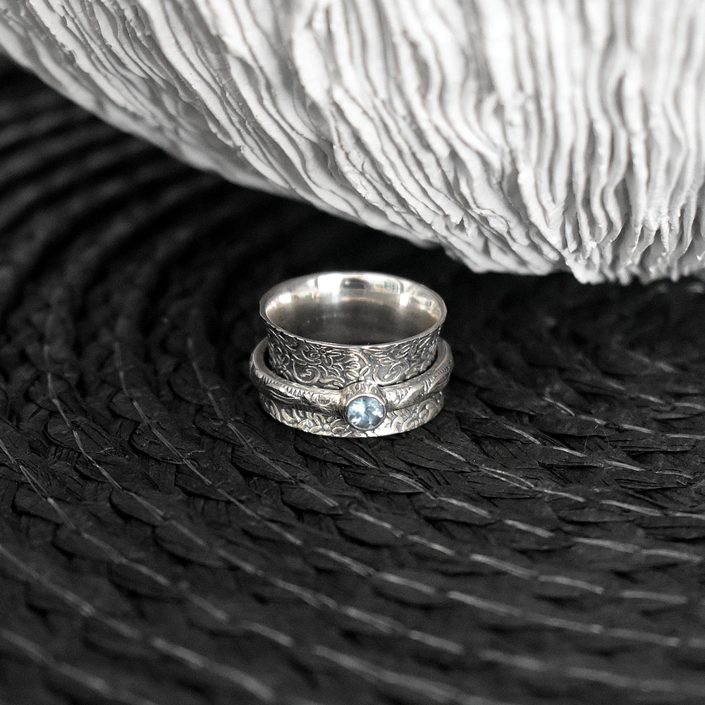 Catalina blue topaz spinning ring