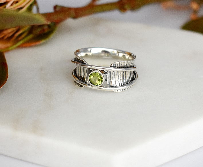 Catalina bark effect peridot facet spinning ring