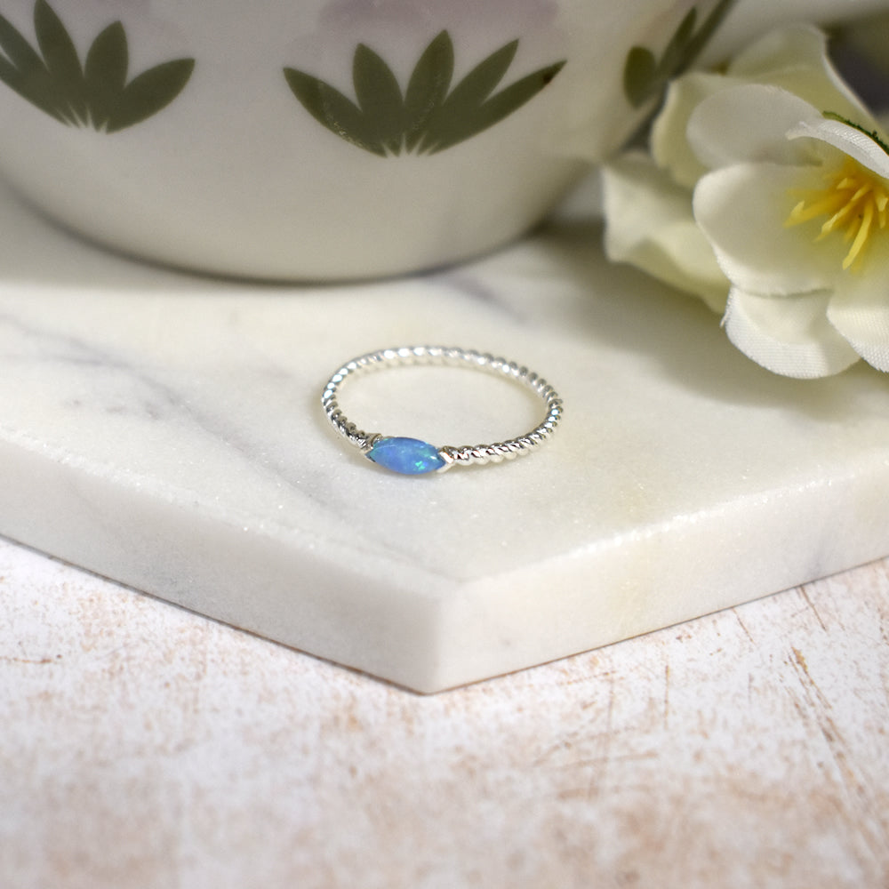 Bethan marquis blue opalique twisted band ring