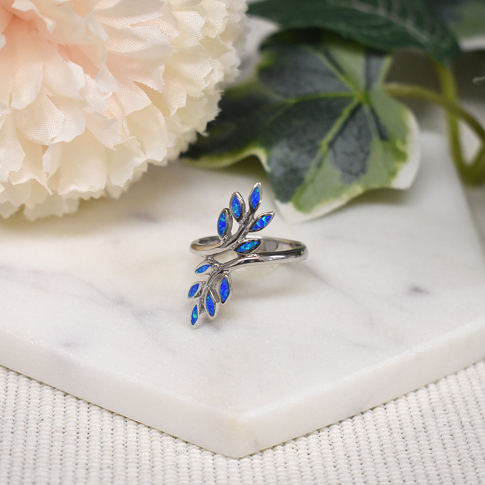 Emerie double sprig crossover blue opalique ring