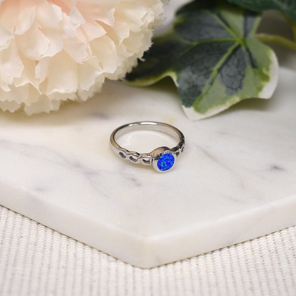 Diana blue opalique infinity shank ring