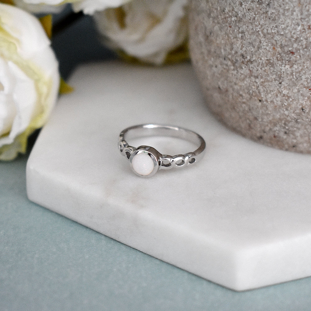 Diana white opalique infinity shank ring