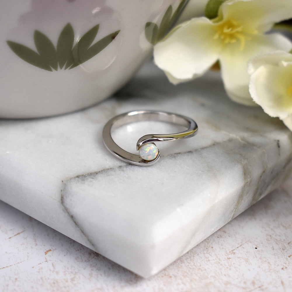 Diana wrapover small white opalique ring