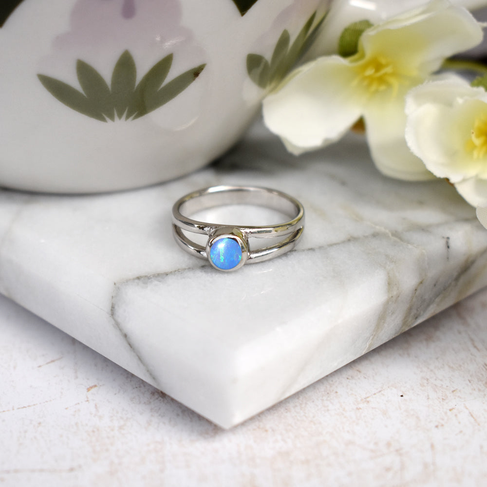 Diana split shank blue opalique ring