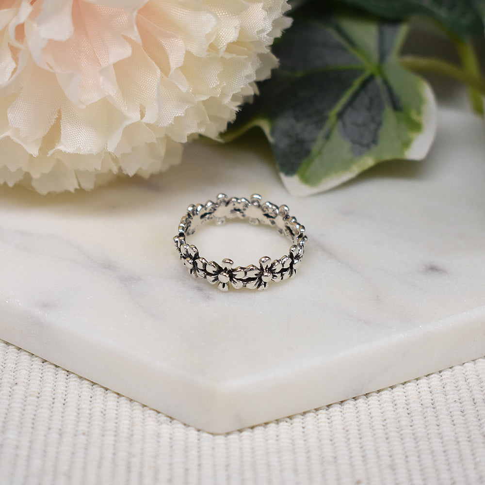 Liana linked flower ring