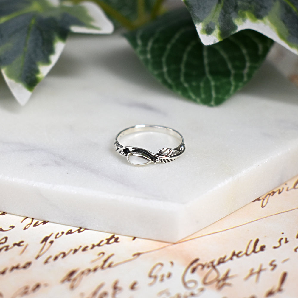 Zora teardrop mother of pearl wrapped leaf ring
