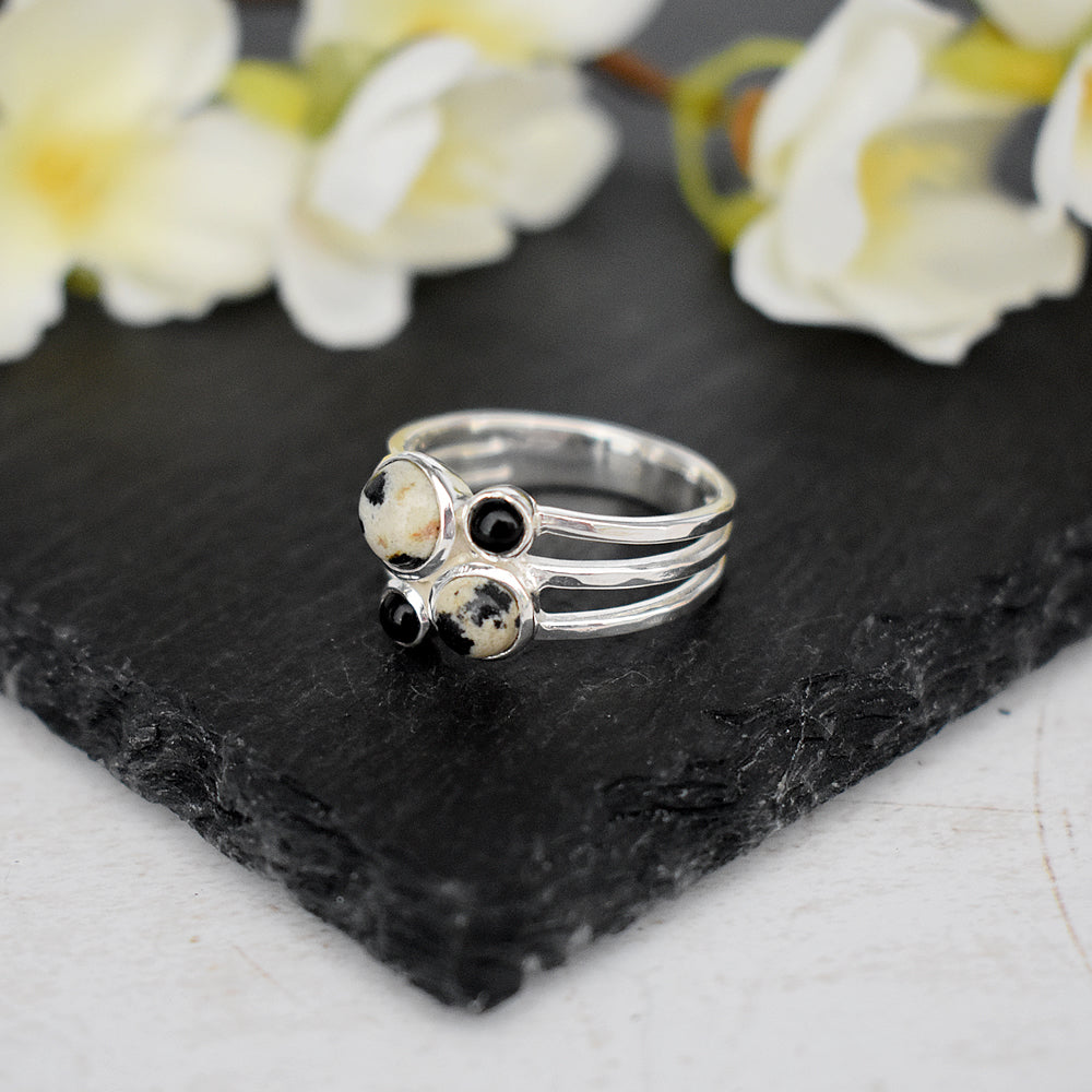 Ivy four dalmatian jasper & black onyx split band ring