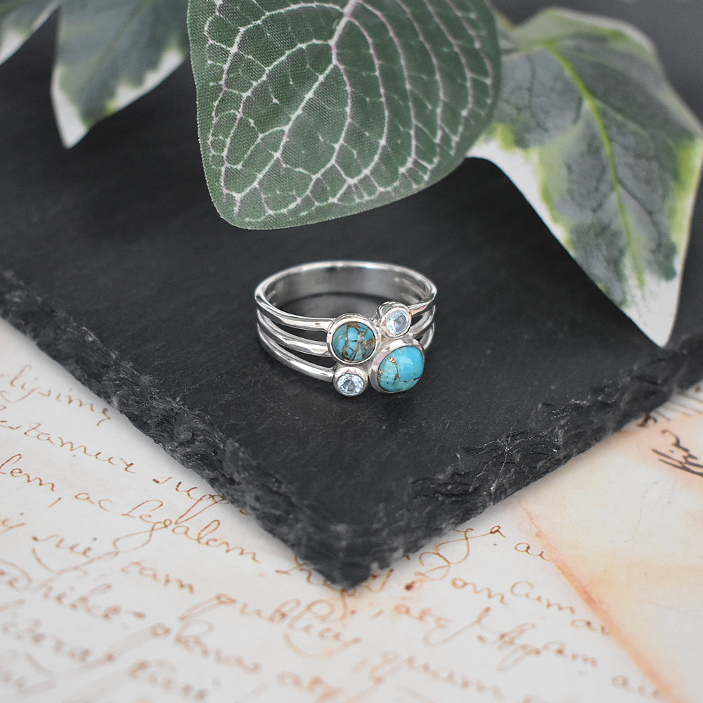 Ivy four blue mohave & blue topaz split band ring