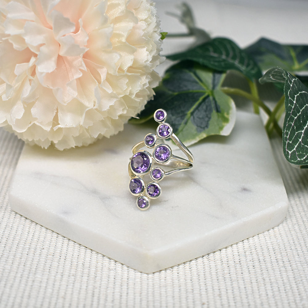 Lola nine stone split shoulder amethyst facet ring