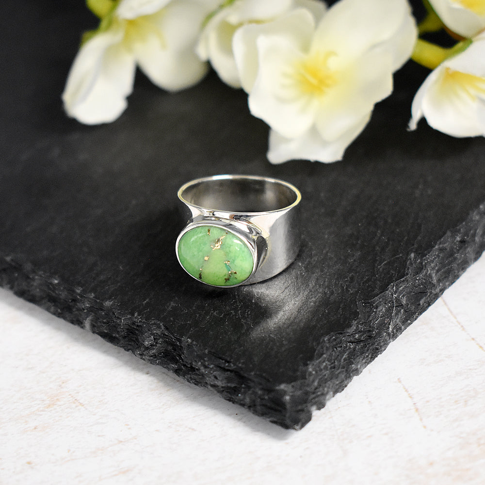 Samira wide oval green mohave ring