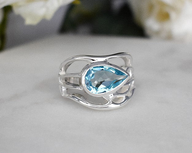 Lola teardrop blue topaz wave design ring