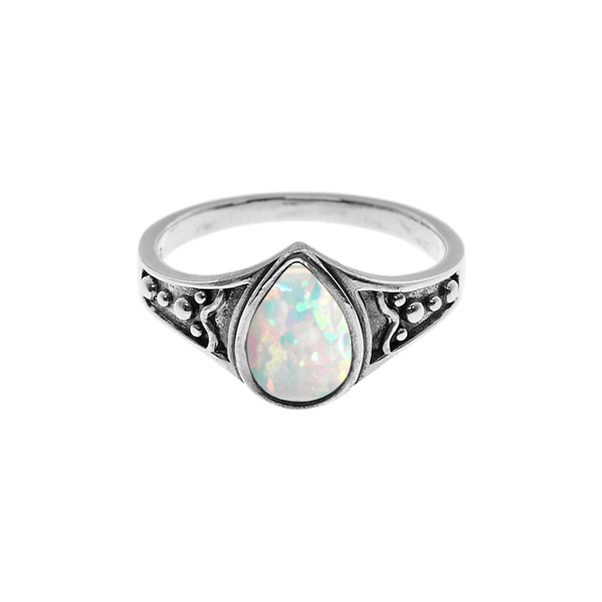 Sabrina teardrop white opalique with shoulder detail ring