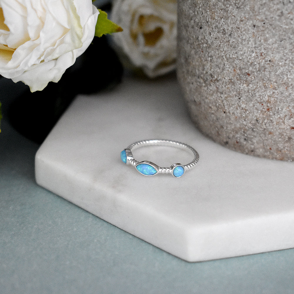Angelica multi-shape blue opalique rope ring