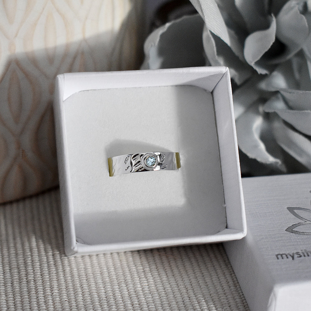 Lexi blue topaz band ring