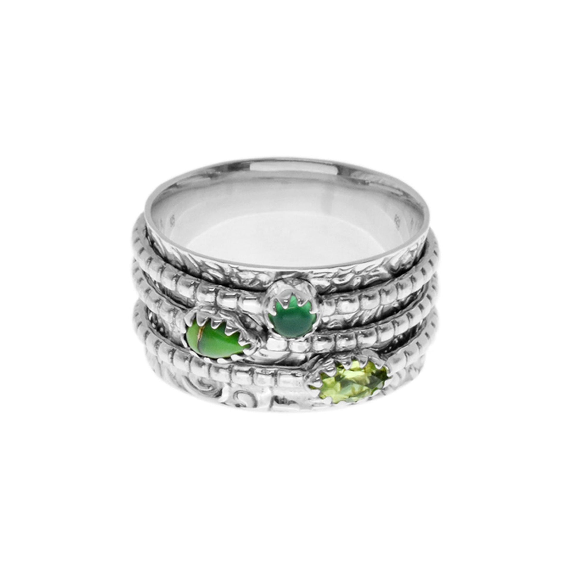 Catalina triple spinning ring with green stones
