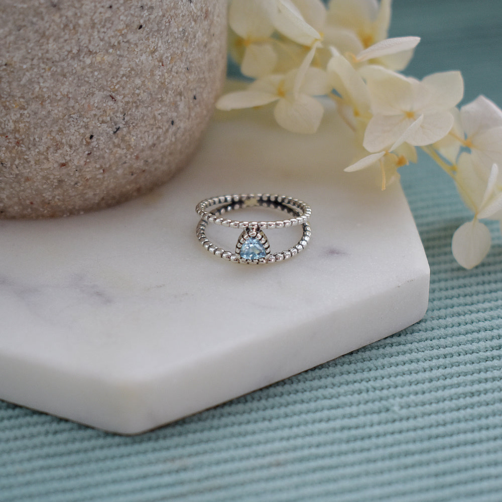Catalina split bobble ring with blue topaz