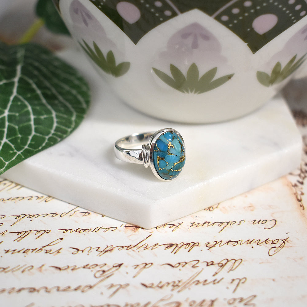 Samira oval blue mohave with shoulder detail ring