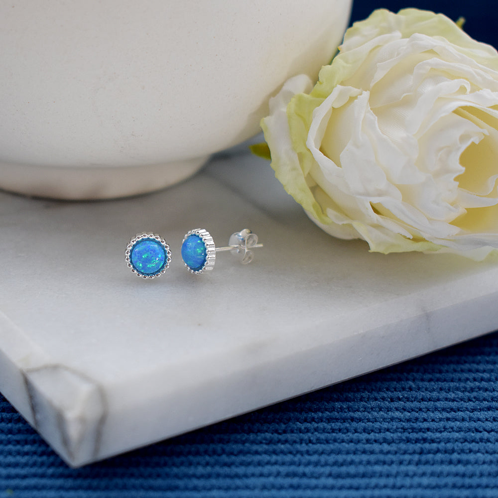 Bethan fancy round blue opalique studs